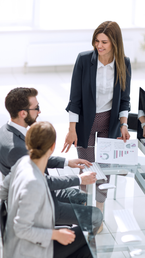 Finance team discussing stats