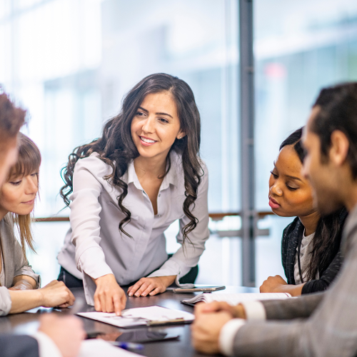 Woman presenting to finance team